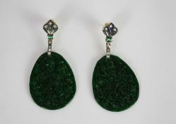 Pair of Jade, Emerald and Diamond drop earrings, each set with oval shaped patterned jade panels,