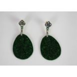 Pair of Jade, Emerald and Diamond drop earrings, each set with oval shaped patterned jade panels,