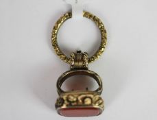 Georgian carnelian seal with split ring, gilt metal seal, floral engraved detail, 18.5x16mm plain