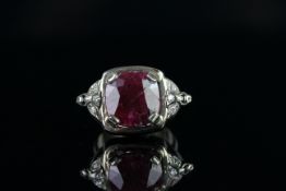14ct White Gold Ruby and Diamond ring featuring centre, cushion cut, natural Ruby (11.04ct), claw
