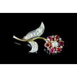 EDWARDIAN RUBY AND DIAMOND TWO TONE FLOWER BROOCH, 18ct, total weight 8.57 gms.