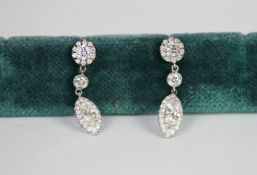 Marquise diamond drop earrings, central marquise cut diamond with a brilliant cut diamond set