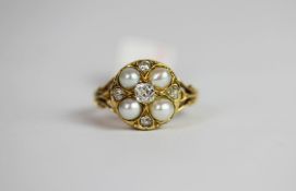 Pearl and Diamond ring, set with 4 pearls and 5 diamonds approximately 0.45ct, stamped 18ct yellow