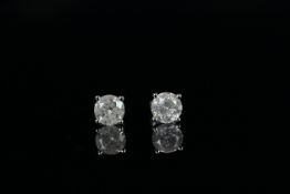 14ct White Gold Diamond stud earrings featuring, 2 round brilliant cut Diamonds (2.21ct TDW), 4-claw