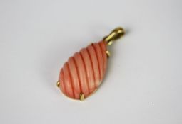 18CT PINK CORAL PENDANT,tested 18ct, 30x15mm,6.59gms, please note not supplied with chain.