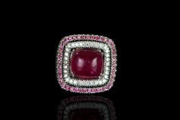 18CT RUBELLITE AND DIAMOND DRESS RING, maker robetti,central stone estimated 11x11mm, total weight