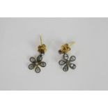 Pair of Blue Topaz and Diamond daisy-style earrings, not hallmarked, butterflys backs, comes with