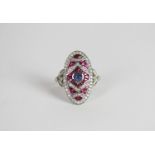 Art Deco-style Ruby, Diamond & Sapphire ring, set with 1 cabochon cut sapphire, surrounded by rubies