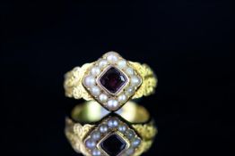 VICTORIAN 18CT GARNET AND SEED PEARL MEMORIAL CLUSTER RING, 'in memory of' band, hallmarked,total