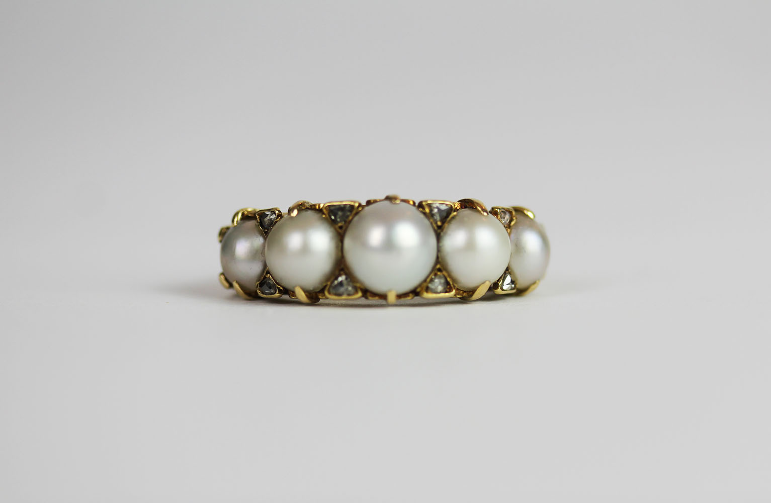 Pearl and Diamond ring, set with 5 graduated pearls and 8 diamonds, finger size L1/2, approximate
