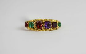 Regard gem set ring, set with a Ruby, Emerald, Garnet, Amethyst, Ruby & Demantoid Garnet, stamped
