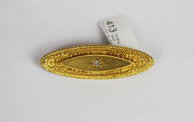 Diamond set brooch, set with 1 round brilliant cut diamond, stamped 15ct yellow gold, approximate