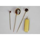 3x stick pins and a carved bone pendant, Garnet foil backed stick pin, Cameo and Garnet examples,