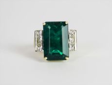 Diamond & Green stone ring, set with emerald cut unknown green stone approximately 10.18ct, 4 claw