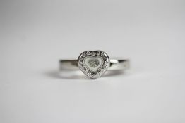 18CT WHITE GOLD DIAMOND SET PAVE HEART RING WITH MOVING DIAMOND