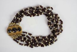 Garnet and seed pearl multi strand bracelet, rows of strung faceted bead garnets and seed pearls,