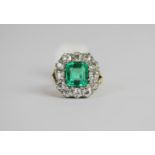 Emerald and Diamond ring, set with 1 cushion cut emerald approximately 2.45ct, 12 claw set,