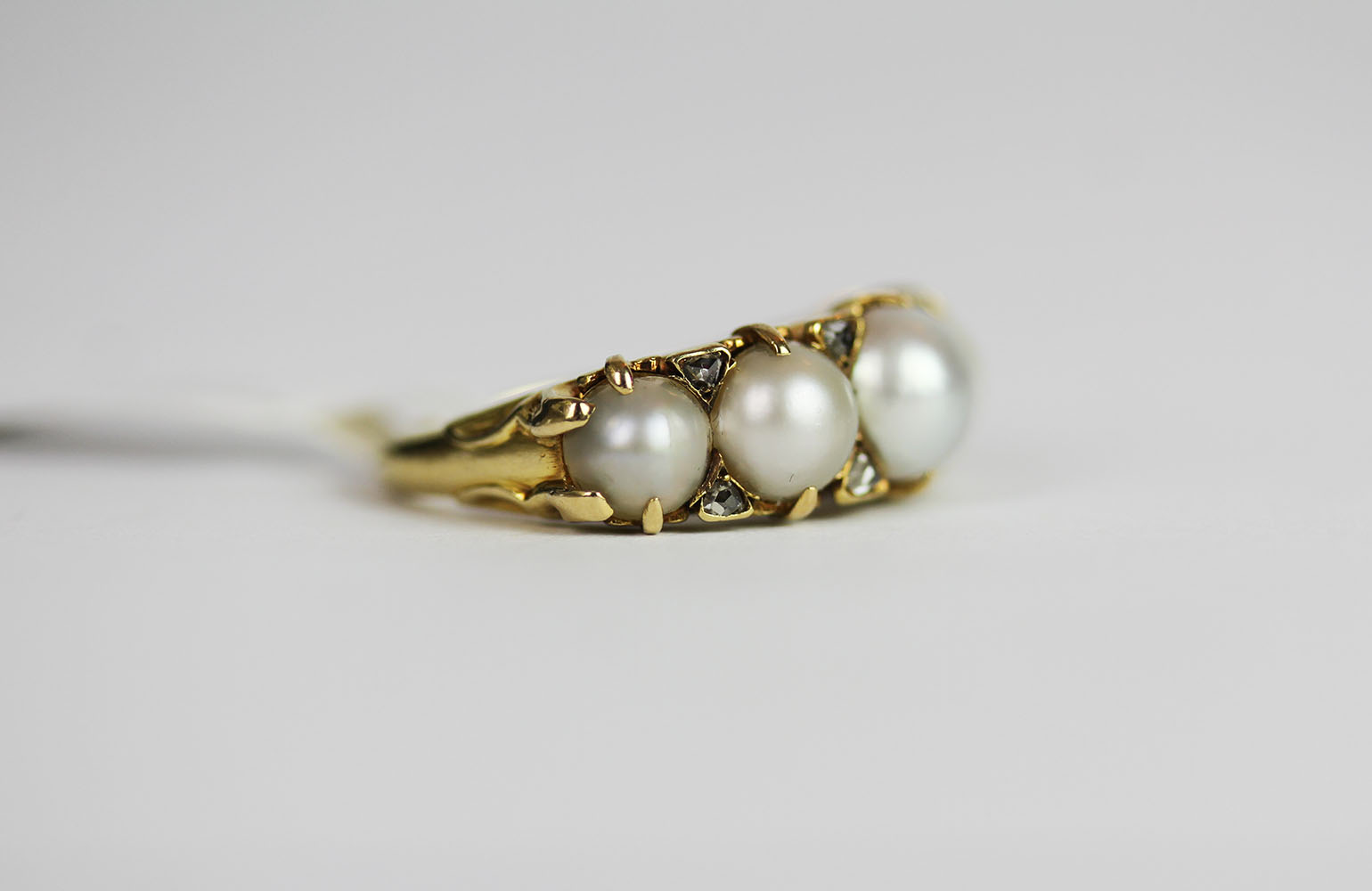 Pearl and Diamond ring, set with 5 graduated pearls and 8 diamonds, finger size L1/2, approximate - Image 2 of 3