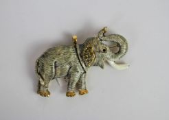 Enamel Elephant brooch, stone set ears and eyes, 6x4cms, continental marks, tested as 18ct,