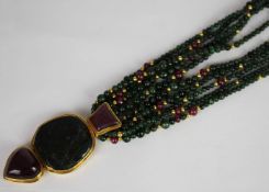 Eileen Coyne - Tourmaline and and Ruby necklace, large cabochon Rubies and a feature piece of