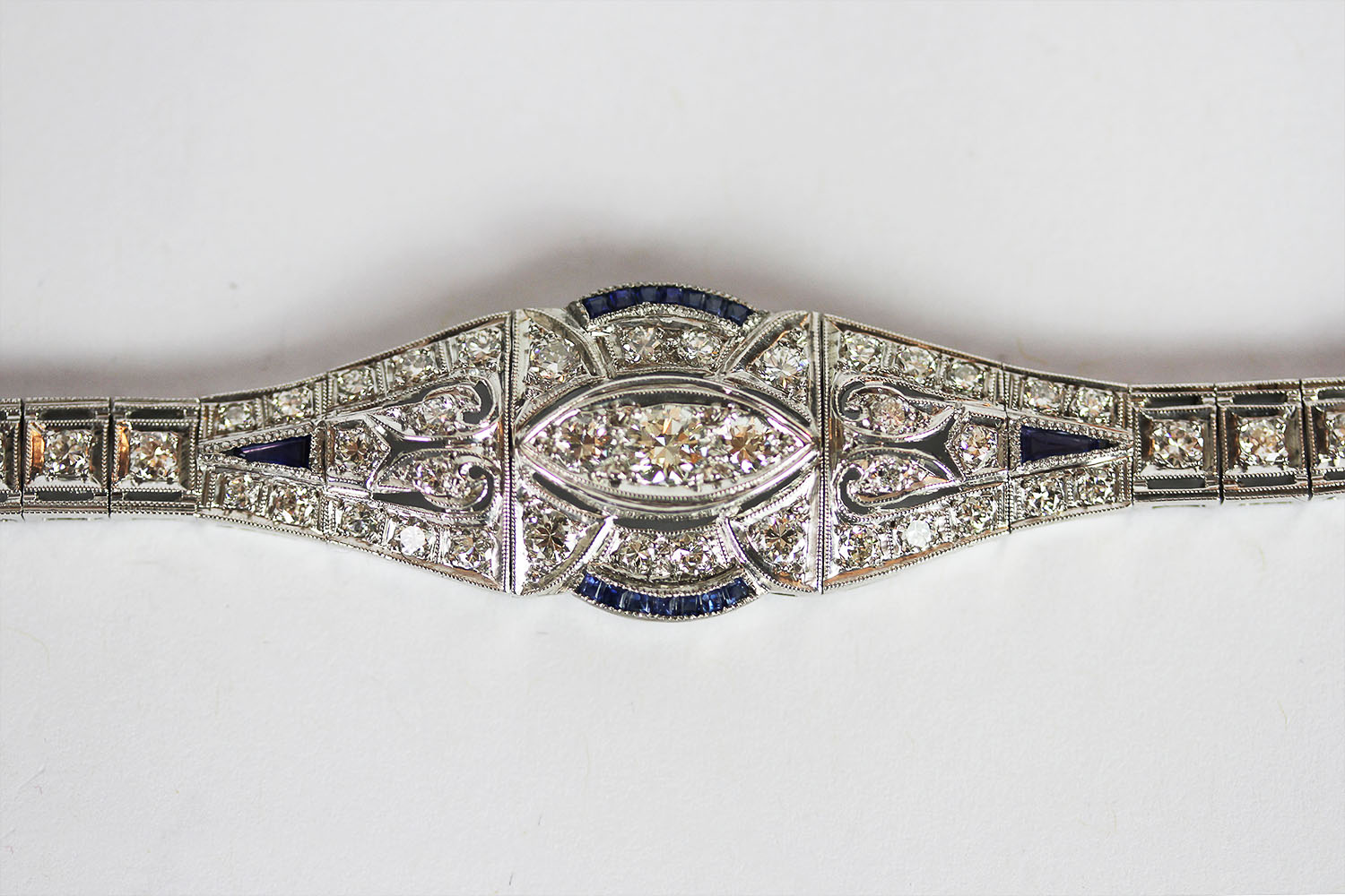 Sapphire and Diamond bracelet, set with 14 baguette cut sapphires and 2 trillion cut sapphires,