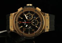 GENTLEMANS 18K HUBLOT BIG BANG, MODEL 301-W, round, black dial with gold illuminated hands, arabic