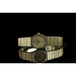 LADIES BAUME & MERCIER TWO TONE DRESS WATCH,round, silver dial with sword gold hands, gold dot