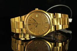 GENTLEMEN'S OMEGA GENEVE AUTOMATIC DATE WRISTWATCH, circular champagne dial with gold and black hour