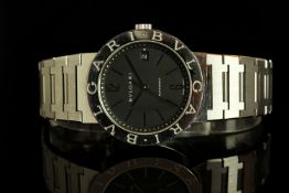 GENTLEMANS BVLGARI BB38SS,round, black dial with silver hands, arabic and baton markers.named