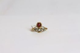 Georgian Garnet ring, set with a rose cut diamond and a cabochon cut garnet, mounted in silver and