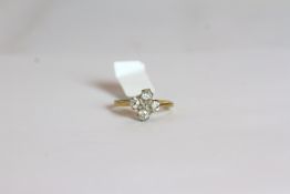 18CT FIVE STONE CROSS RING ,ESTIMATED AT 1.00CT TOTAL, stamped 18ct, total weight 3.10 gms , size