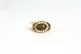 Georgian Mourning ring, set with seed pearls, finger size L.