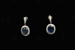 .14k WHITE GOLD SAPPHIRE AND DIAMOND CLUSTER DROP EARRINGS, sapphires estimated as 4.25ct,