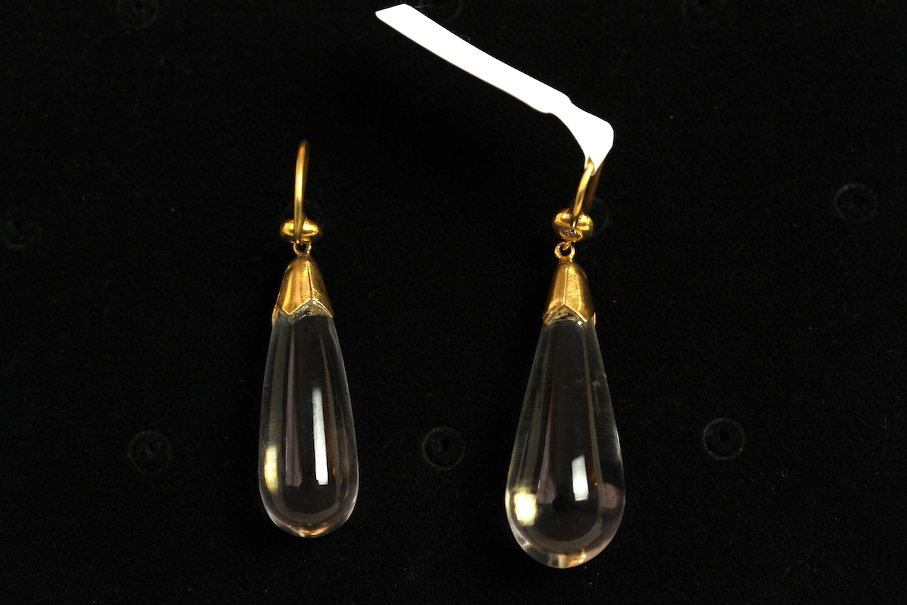 Rock crystal drop earrings, 30mm drops, suspended from a diamond set French wire fittings, yellow