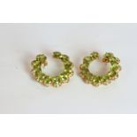 Pair of Peridot and Diamond set hoop earrings, set with a total of 22 peridots totalling