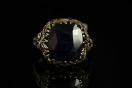 Sapphire dress ring, large cushion cut dark blue sapphire, 12.5x11.3mm, mounted in a pierced work