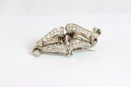 Art Deco Diamond Spray brooch, mounted with brilliant and transitional cut and baguette cut