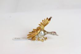 Marbe Pearl and diamond set bird brooch, Marbe pearl body, diamond set neck with ruby eyes, gold