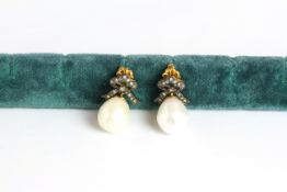 Pair of white pearl and diamond drop earrings, pearls measure approximately 12.3mm x 10.7mm and 11.