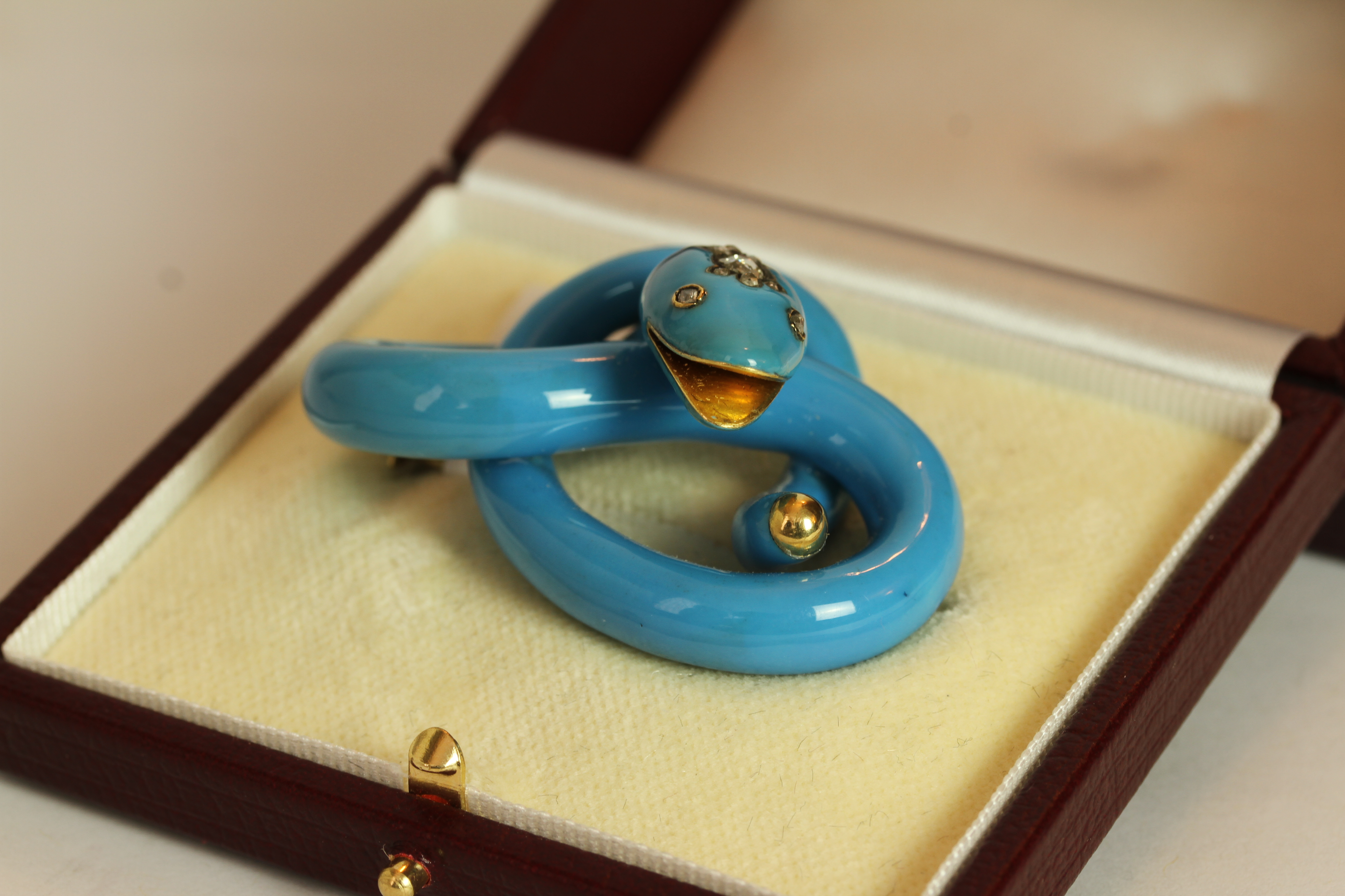 Victorian Turquoise snake brooch, carved turquoise set with diamond eyes and head, approximate width