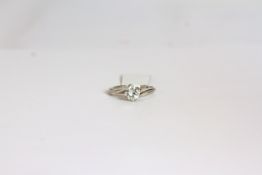 18CT WHITE GOLD SINGLE STONE BRILLIANT CUT DIAMOND RING , ESTIMATED AT 0.66CT,hallmarked, total