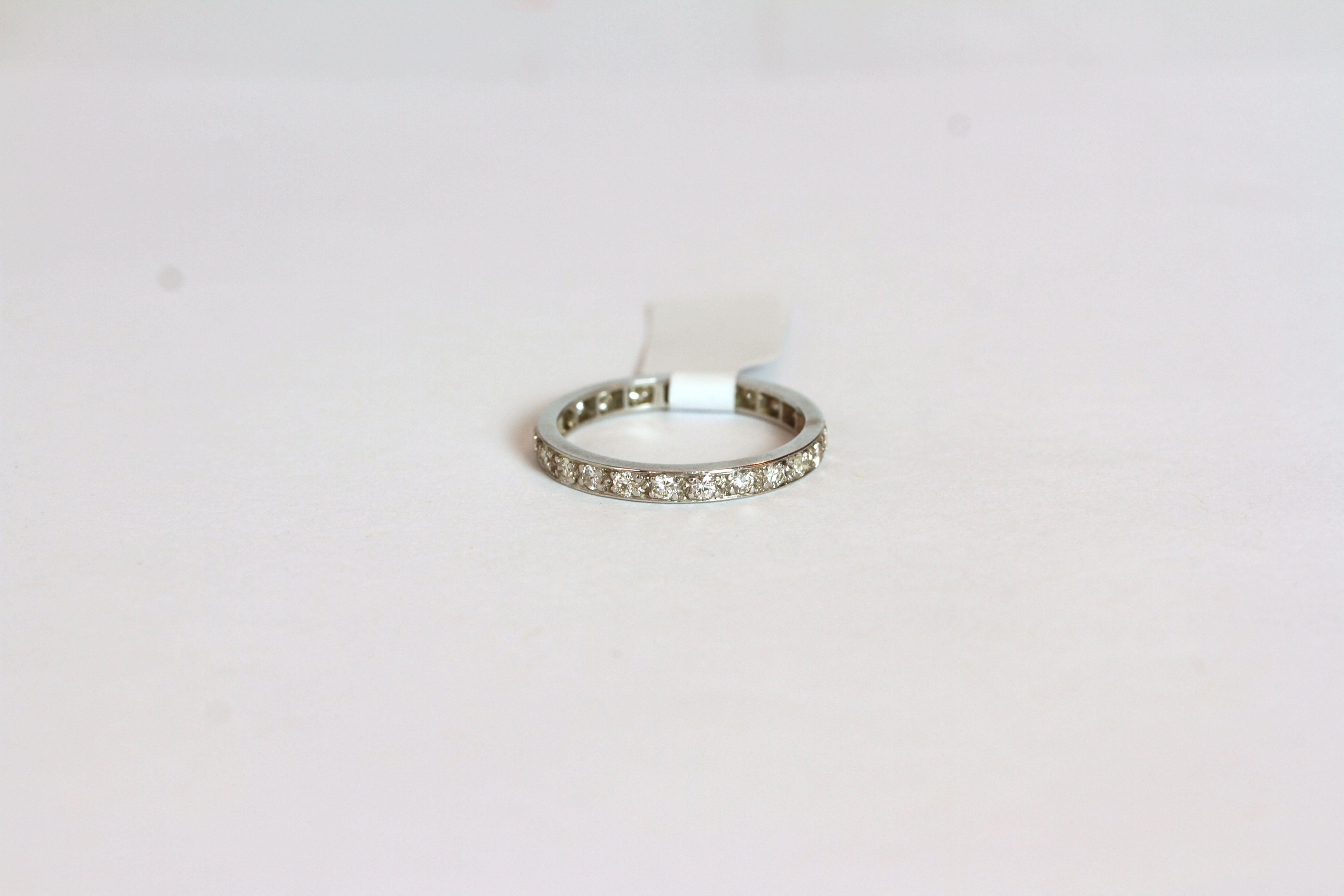 Diamond eternity ring, estimated total diamond weight 0.70ct, finger size Q.