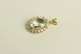14K YELLOW GOLD AQUAMARINE AND DIAMOND CLUSTER PENDANT,centre stone estimated as 5.02ct, very