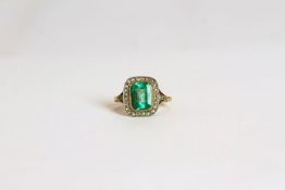 Emerald and Diamond ring, set with an emerald approximately 2.01ct, surrounded by diamonds totalling