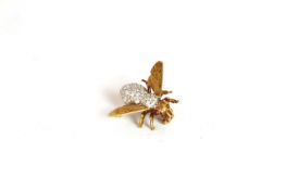 Diamond and ruby set Bee brooch, diamond set body with ruby eyes, golden wings, yellow and white