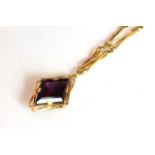 Modernist Amethyst 18ct necklace, large diamond cut Amethyst mounted within 18ct wire work frame,