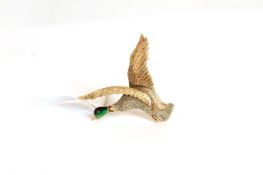 Early 20th Century Enamel and gold Duck brooch, textured gold work body and wings in yellow, white