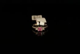 18K PINK SAPPHIRE AND DIAMOND THREE STONE RING,centre stone estimated as 4.1 x 4.1mm,diamonds