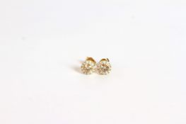 14K YELLOW GOLD BROWN AND WHITE DIAMOND STUD EARRINGS, centre stones estimated as 0.57ct total,