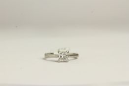 PLATINUM SINGLE PRINCESS CUT DIAMOND ESTIMATED AT 0.80CT, colour D,clarity VVS1, four claw sat mount